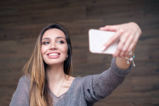 istock Happy woman doing selfie 915276406
