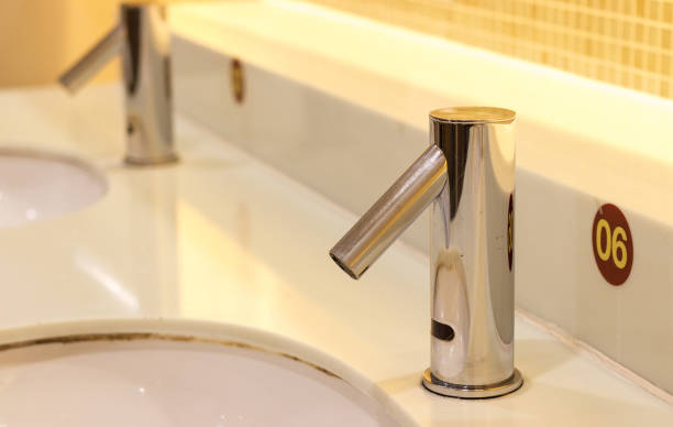 istock Water tap in bathroom. 915293736