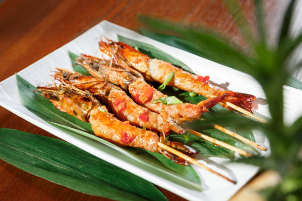 istock Fried hot big size shrimps  on sticks 915297762