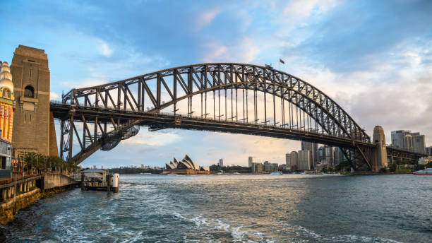 Sydney Harbour Bridge at dusk View of Sydney harbour from Milsom's Point sydney harbor photos stock pictures, royalty-free photos & images