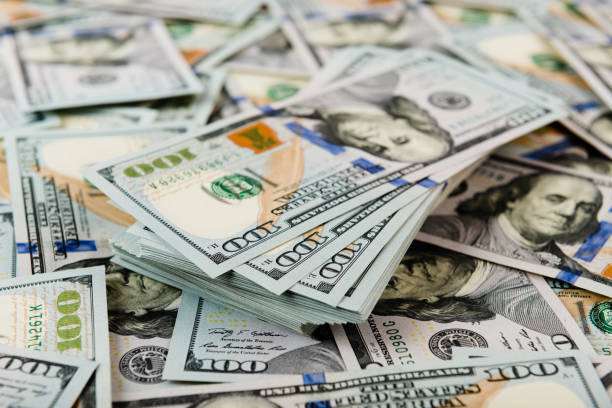 istock Background with money american hundred dollar bills 915303800
