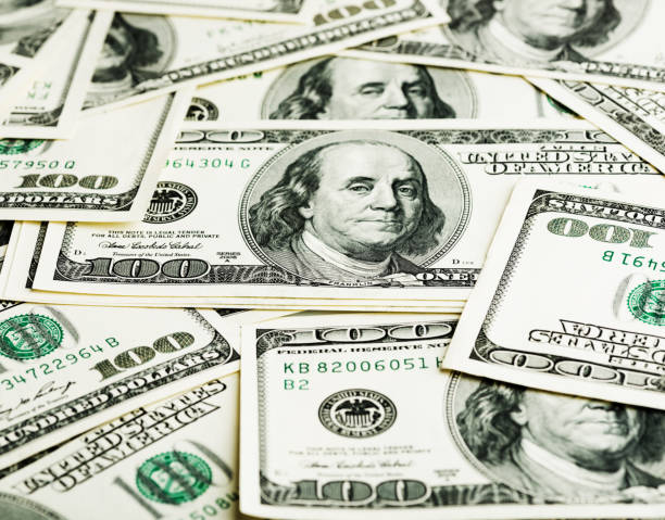 istock Background with money american hundred dollar bills 915303934