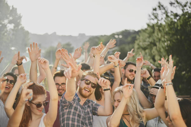 istock Big crowd of people having a party 915304744