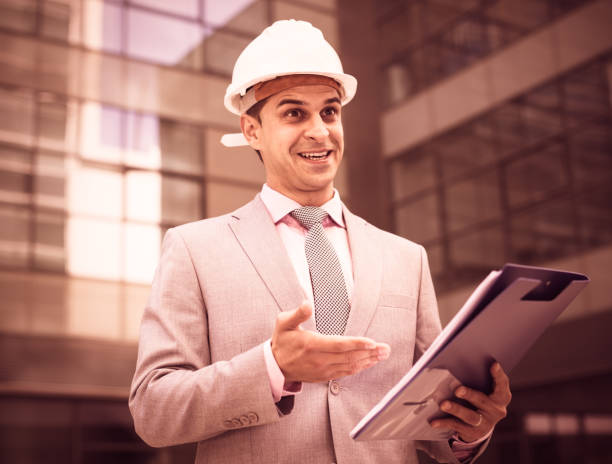 istock Satisfied businessman holding agreement papers 915311052