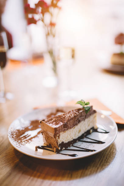 istock Slice of cheesecake served on a decorated plate. 915314758