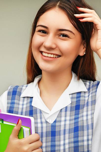 istock Beautiful Pretty Female Student 915324116