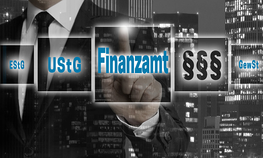 Finanzamt (in German Tax office) concept is shown by businessman.