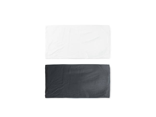 Blank black and white folded soft beach towel mockup Blank black and white folded soft beach towel mockup. Clear wrapped wiper mock up laying on the floor. Shaggy fur bath textured jack-towel top view. Domestic cloth kitchen overlay template wrap dress stock pictures, royalty-free photos & images
