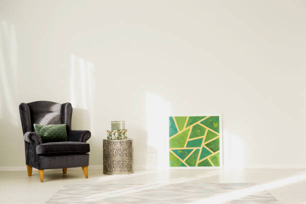 istock Living room with dark armchair 915328474