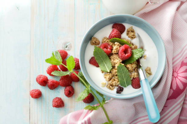 istock Breakfast: Granola with Raspberries and Mint Still Life 915331868