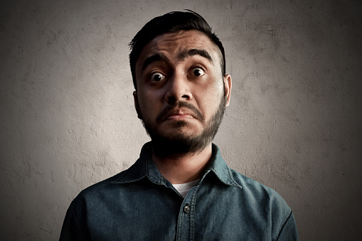 Asian Man Funny Face Stock Photo - Download Image Now - Sneering, India ...