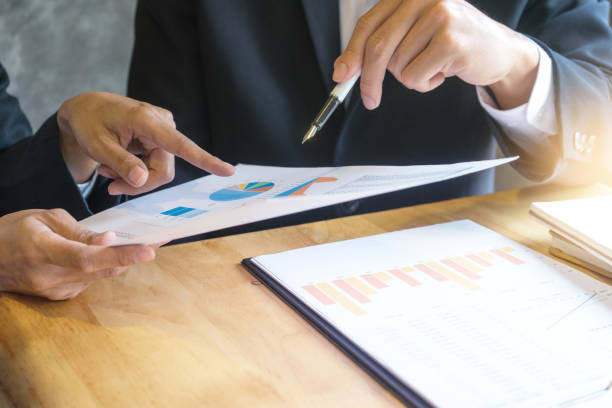 istock two businessman talk and discuss about business work 915340336