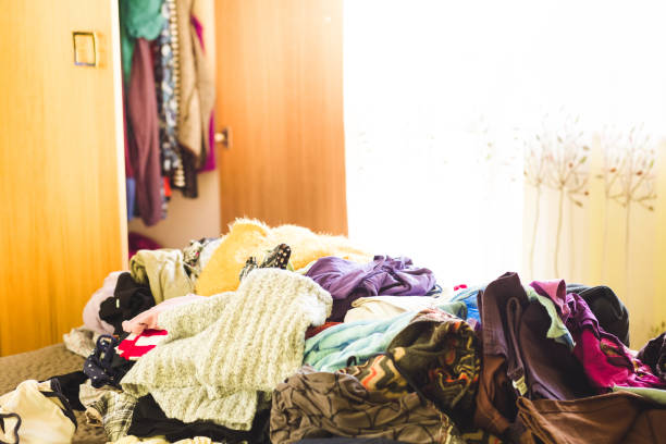 istock Pile of clothes  spring cleaning 915341332