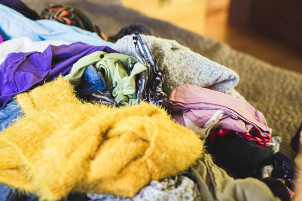 istock Pile of clothes  spring cleaning 915341352