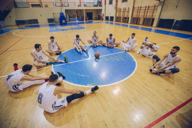 istock Basketball team stretching 915354160