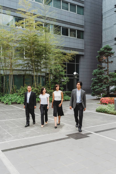 istock Japanese team walking together 915357972
