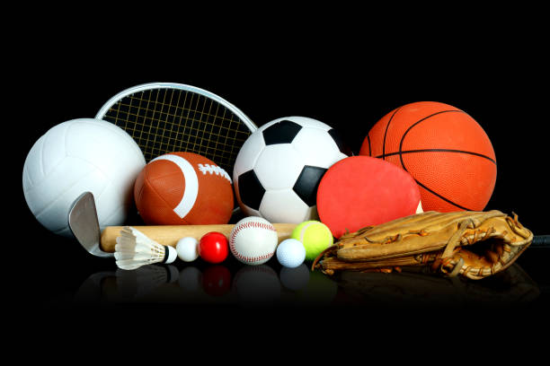 istock Sports Equipment on black background 915362944