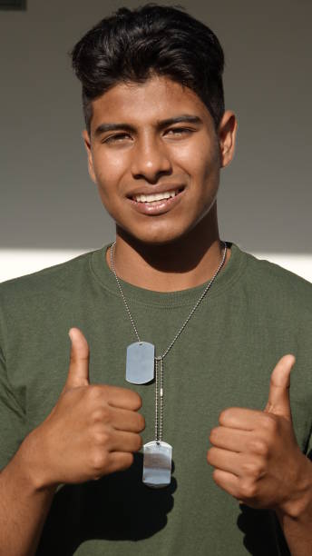 istock Good Looking Male Soldier With Thumbs Up 915366026