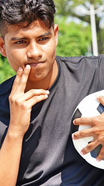 istock Male Soccer Player And Confusion 915366962