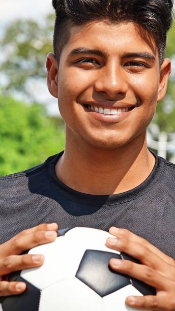 istock Smiling Male Soccer Player 915367004