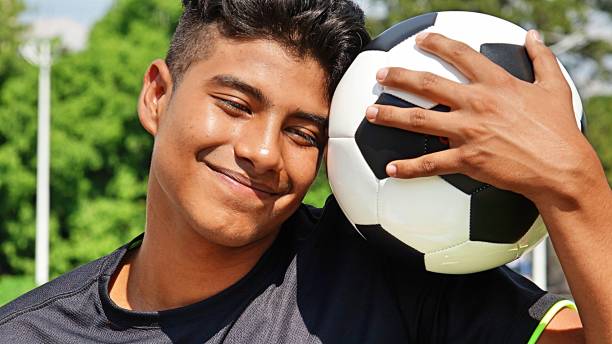 Fit Male Soccer Player Wondering