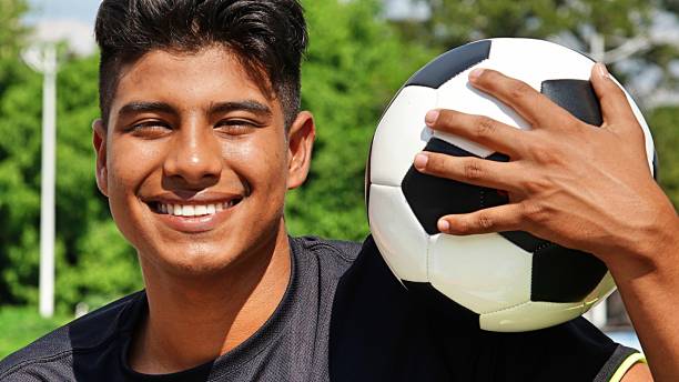 istock Fit Male Soccer Player Smiling 915367068