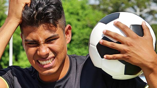 istock Young Male Soccer Player Under Stress 915368344
