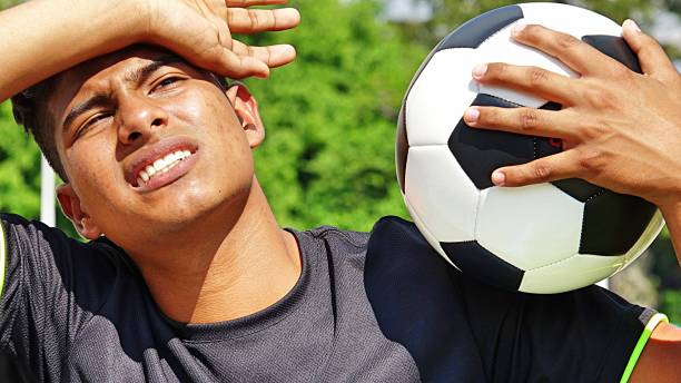 istock Tired Male Soccer Player 915370670