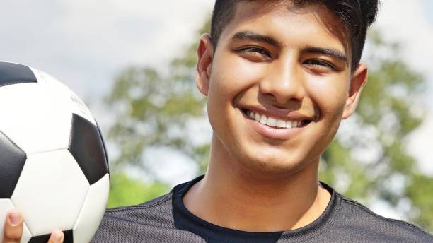 istock Smiling Young Male Soccer Player 915371404