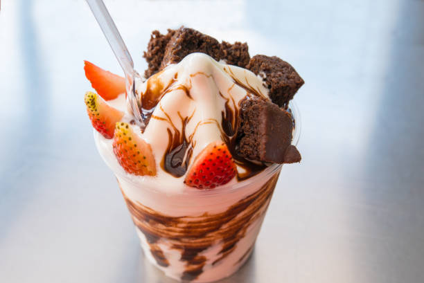 istock yogur with chocolate cream strawberries and chocolate cake 915371744