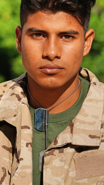 istock Serious Latino Male Soldier 915372306