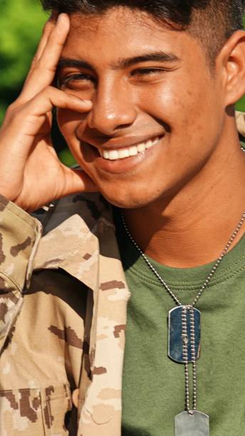 istock Daydreaming Latino Male Soldier 915372402