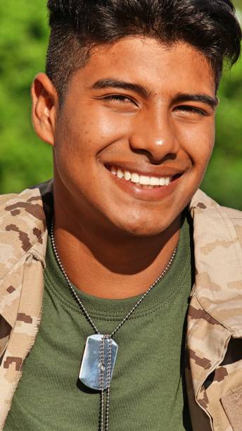 istock Young Male Soldier Smiling 915372528