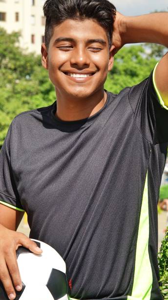 istock Athletic Male Soccer Player And Happiness 915372888