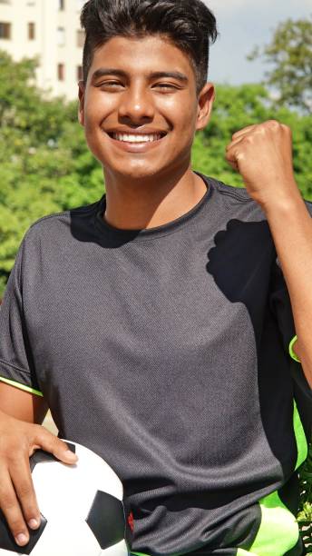 istock Male Soccer Player And Winning 915375562