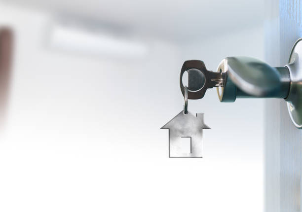 istock Open door with keys in keyhole 915375806