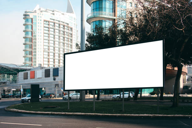 blank billboard at street - afixar cartaz imagens e fotografias de stock