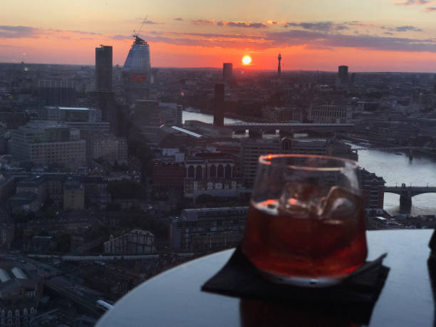 istock Cocktail over London Sunset 915380700
