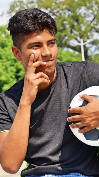 istock Male Soccer Player And Confusion 915381016