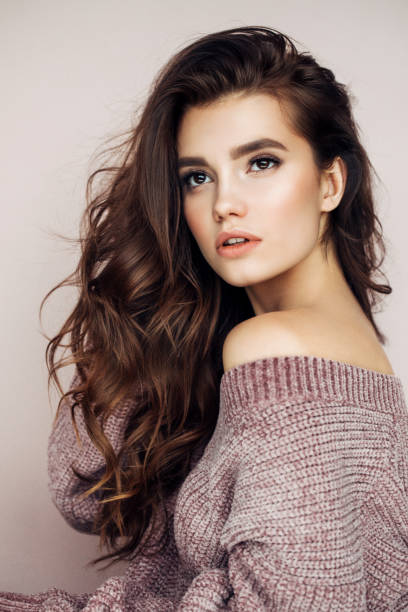 istock Beautiful woman wearing sweater 915383520