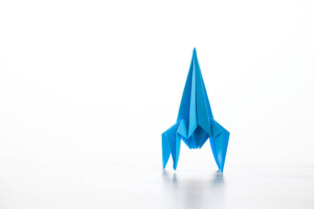 Paper homemade origami rocket. stock photo