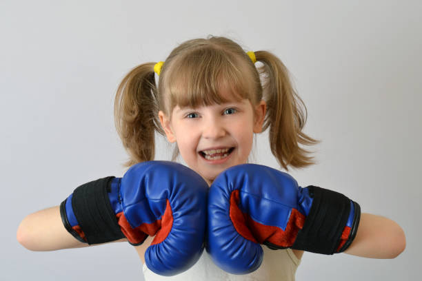 istock Kid boxer.Child with Boxing gloves. 915388888