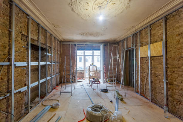 istock Working process of installing metal frames for plasterboard (drywall) for making gypsum walls and tools in apartment is under construction, remodeling, renovation, extension, restoration, reconstruction and upgrade. 915391252