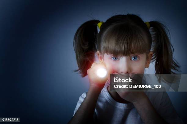 Child Is Afraid Of The Dark Stock Photo - Download Image Now - Flashlight, Child, Fear
