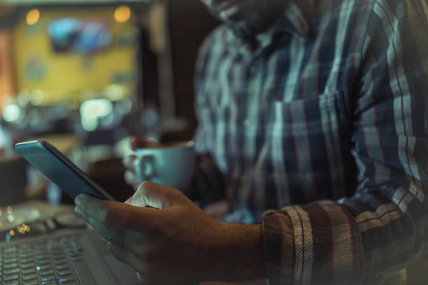 istock Working on laptop in a coffee shop 915395204