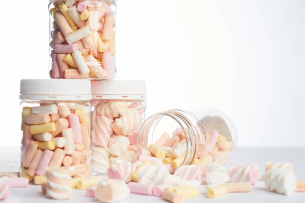 istock Colorful small marshmallows yellow 915395280