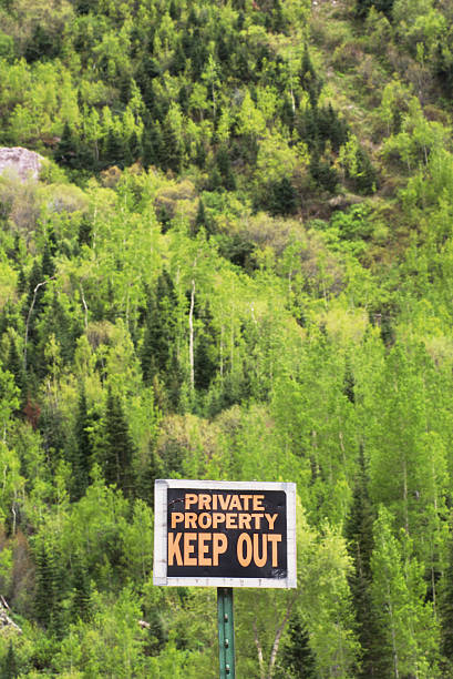 istock private property keep out sign with forest landscape 91539695