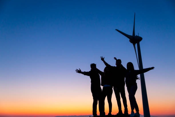 istock Young friends enjoying nature at sunset 915399768