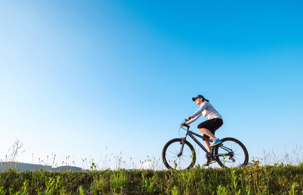istock Woman ride a bicykle 915400286