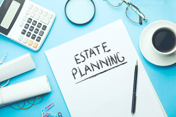 istock estate  planning text on page with stationary 915435430